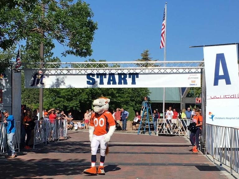 Miles the Mascot at the start line of the Broncos 7k run.