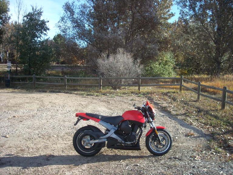 Side view of the Buell Blast with Bikemaster Superbike handlebars and bar-end mirrors.