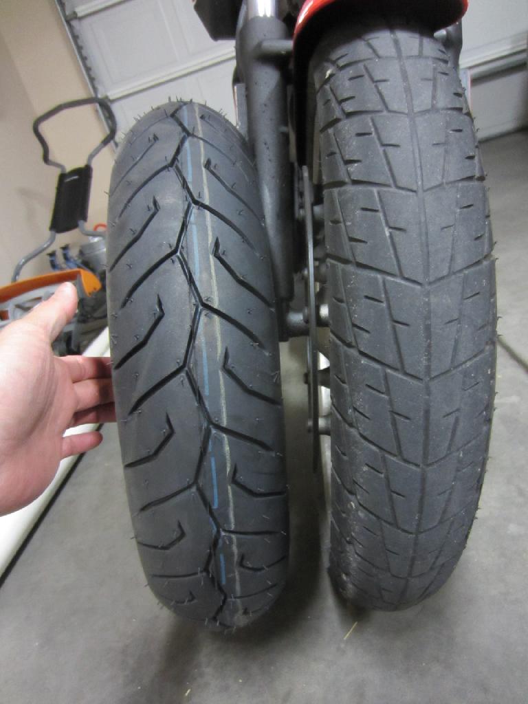 The Pirelli Diablo Scooter 110/70-16 front tire is about .5" wider than the stock Dunlop K330 100/80-16.