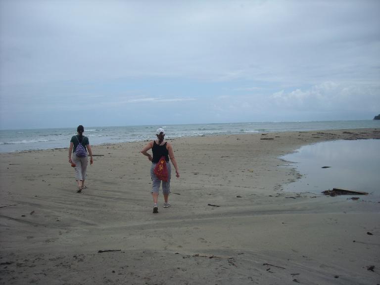 Tori and Raquel taking a stroll on the beach.