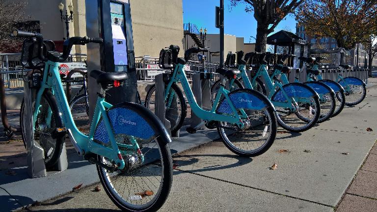 turquoise Bay Area Bike Share bicycles in Redwood City