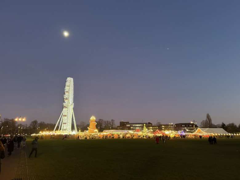 Christmas in Cambridge featured a Ferris wheel, an ice rink, alpine lodge bar, Christmas market, curling lanes, a Christmas tree maze, and games.