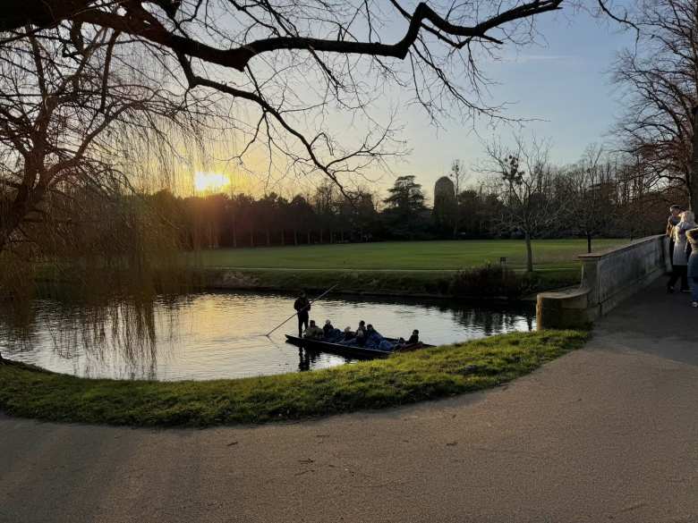 Some folks punting on the River Cam.