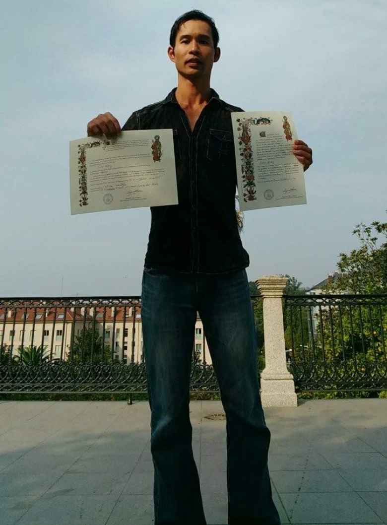 Felix Wong and his certificates of completion of the Camino de Santiago.