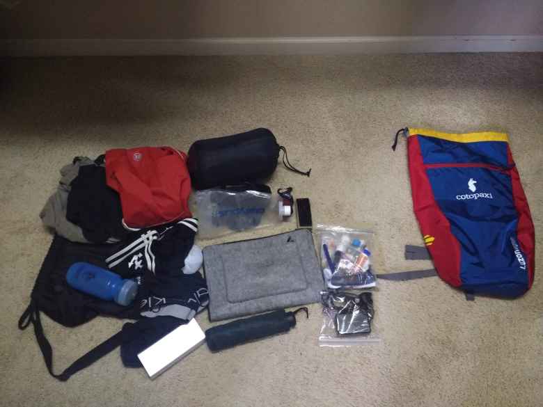 My gear for six weeks in Spain all fit into the blue and red 18L Cotopaxi bag at the right.