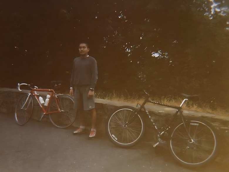 My friend Kiet from Stanford, with my red Cannondale road bike and his black Marin mountain bike at the top of Kings Mountain Road near Skyline Boulevard in Woodside, California.