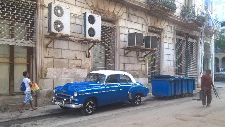 Blue 1950s Chevrolet Fleetline sedan with white top in Havana, Cuba.