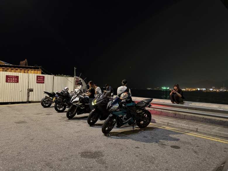 A lot of young sportbike enthusiasts had gathered on a Sunday night at the west end of Stonecutters Island to hang out and admire the view.