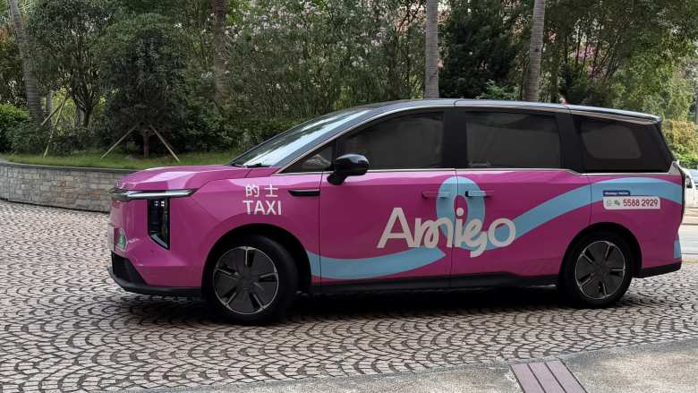 A pink MAXUS van manufactured by SAIC, the same company that owns MG.