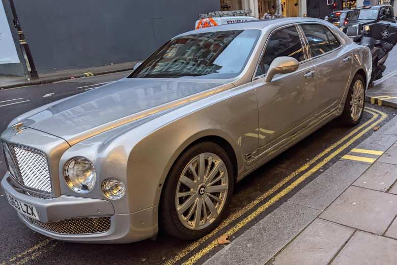 A silver Bentley sedan in London.