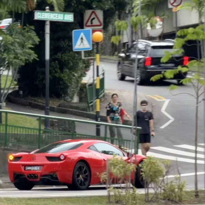 A red Ferrari 458 Italia made in the early-to-mid 2010s.