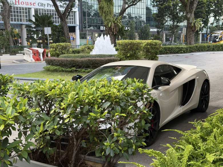 A white McLaren MP4-12C in Singapore.