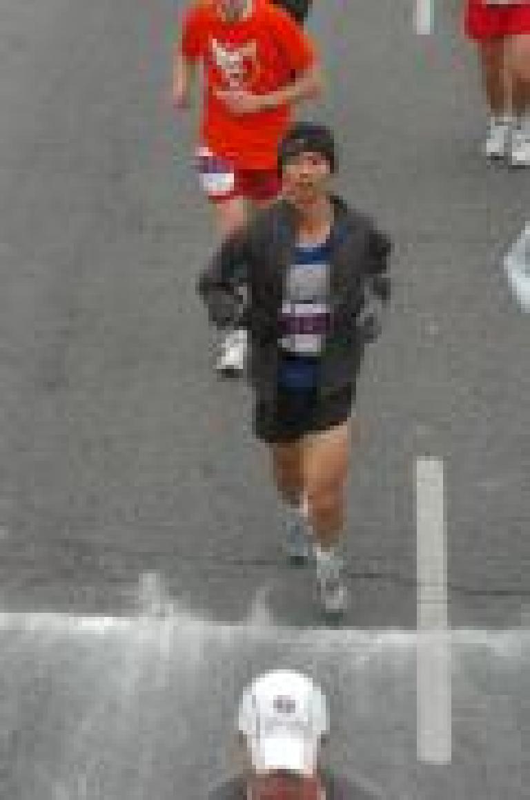 Felix Wong about to cross the finish line. I had unzipped my jacket moments earlier just so my race number would show. Photo: marathonfoto.com. Felix Wong about to cross the finish line. I had unzipped my jacket moments earlier just so my race number would show. Photo: marathonfoto.com.