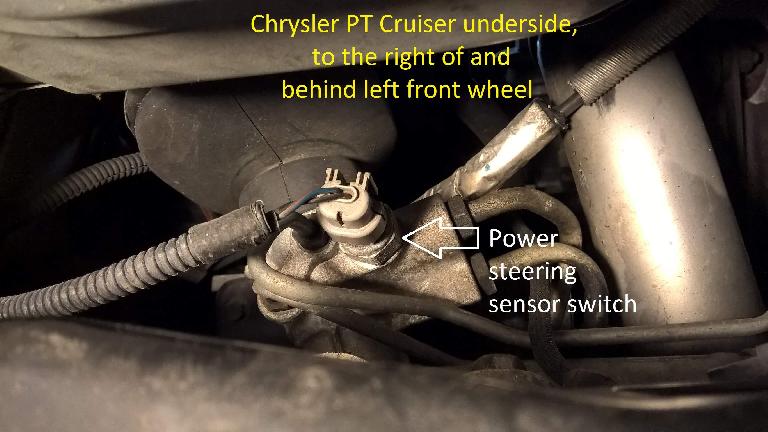 Chrysler PT Cruiser power steering sensor switch underneath vehicle.