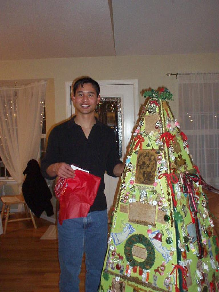 Felix Wong picking some candy off the whatnot tree, which Dee has had since 1973.