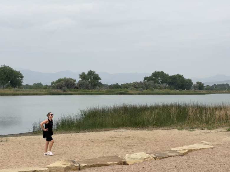 Andrea on the beach of Richards Lake at the end of our run.