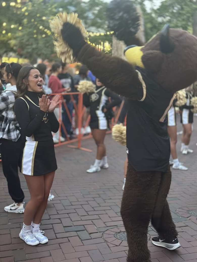 A University of Colorado cheerleader and the CU mascot on Pearl Street Mall in downtown Boulder.