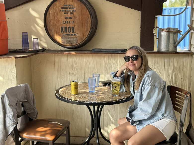 Andrea with a Coors Banquet beer inside the Breckenridge Tap House. Andrea with a Coors Banquet beer inside the Breckenridge Tap House.