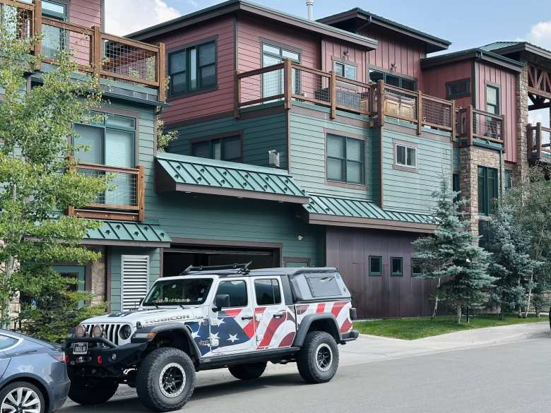 A Jeep Gladiator with a U.S. flag motif parked outside townhomes in Frisco that had nice third-floor terraces. A Jeep Gladiator with a U.S. flag motif parked outside townhomes in Frisco that had nice third-floor terraces.
