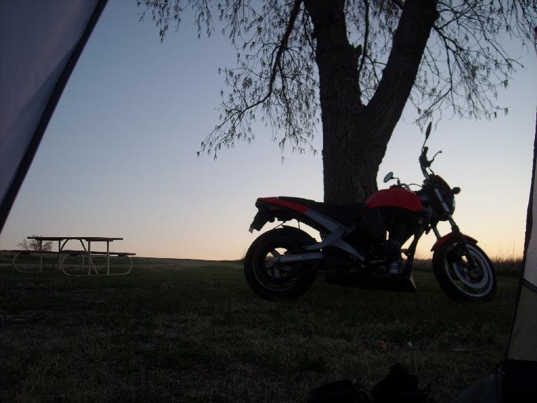 Waking up in the morning to the sight of a nice sunrise and the Buell.