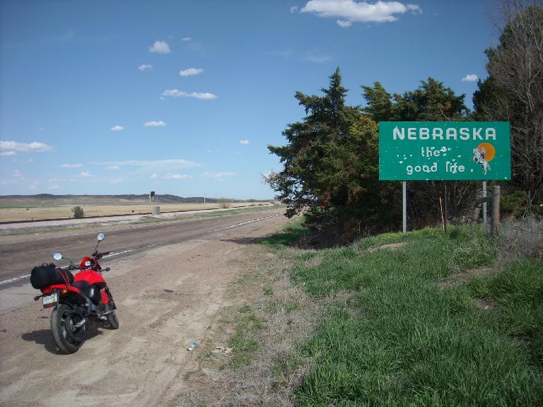 After a few hours of riding through eastern Colorado, I made it to Nebraska.  Seems like part of "the good life" is shooting at this sign.