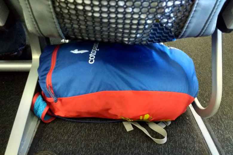 My Cotopaxi Luzon 18L pack---which carried all my gear for six weeks in Spain, including hiking the Camino de Santiago---was small enough to count as a no-charge personal item and fit underneath an airplane seat on Frontier Airlines.