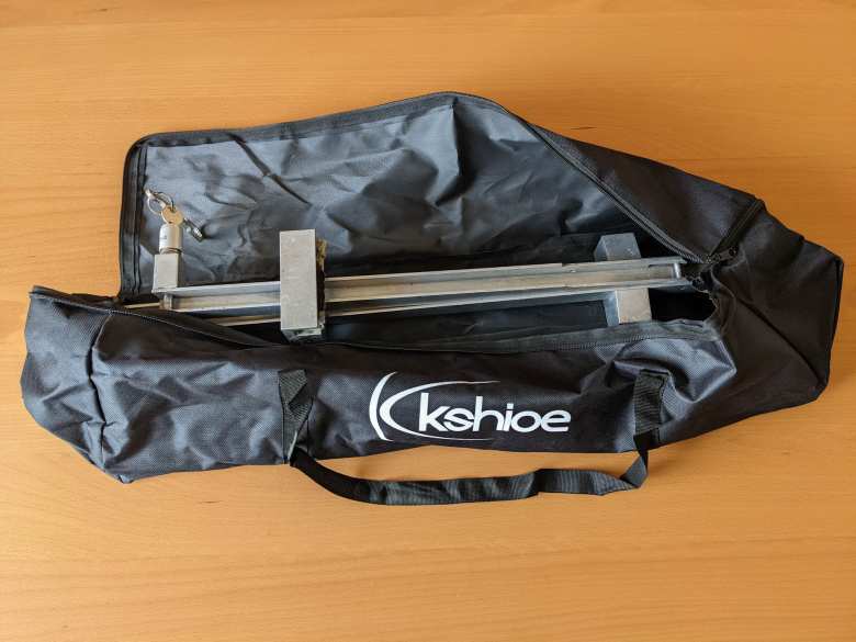 When shipping the bike rack to Mike, I looked for something in the basement to package it in. Turns out that this black carrying bag for Kshioe studio lights was a perfect fit!