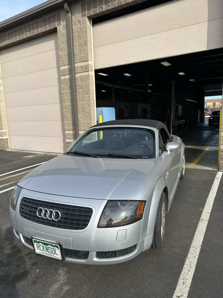 My Audi TT Quattro Roadster after passing a biannual emissions test.