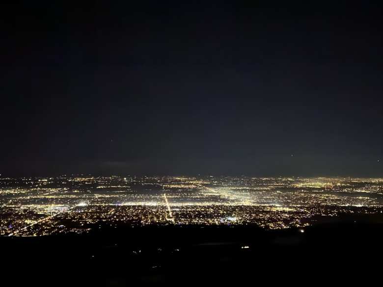 The view of Fort Collins at night from the top of Horsetooth Rock.