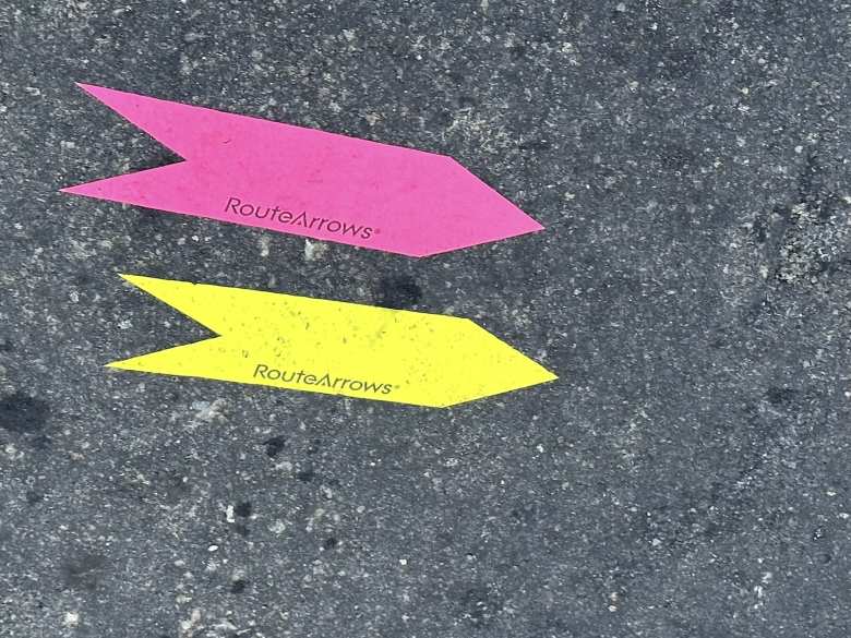 The yellow and pink arrows indicated turns for the metric century and 25-mile route, respectively, of the Delta Century.