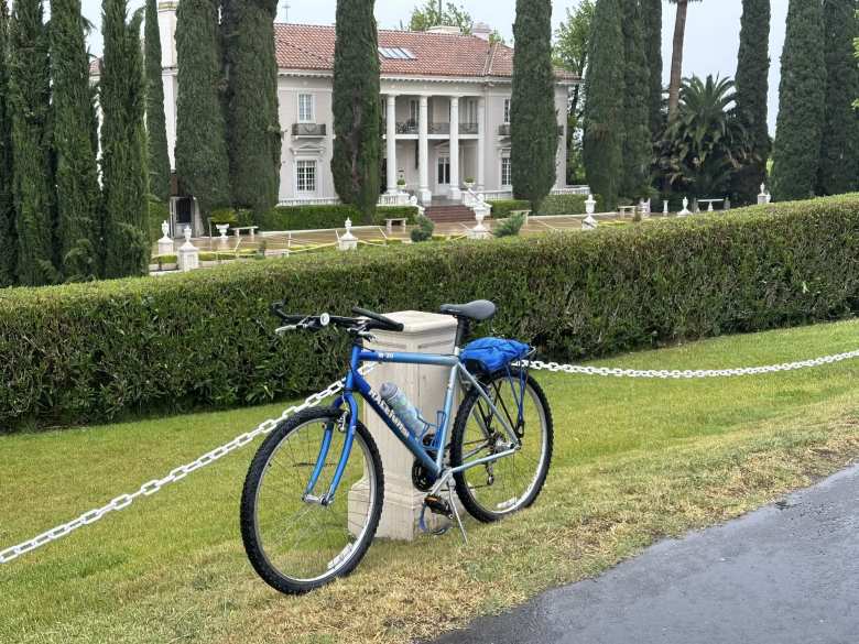 My blue 1996 Raleigh M30 in front of the historic Grand Island Mansion.