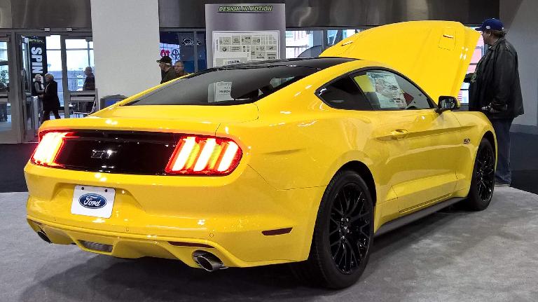 Yellow 2016 Ford Mustang coupe.