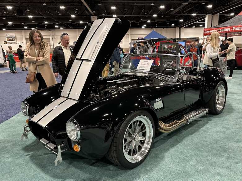 A black Shelby Cobra powered by a Roush 427 motor.