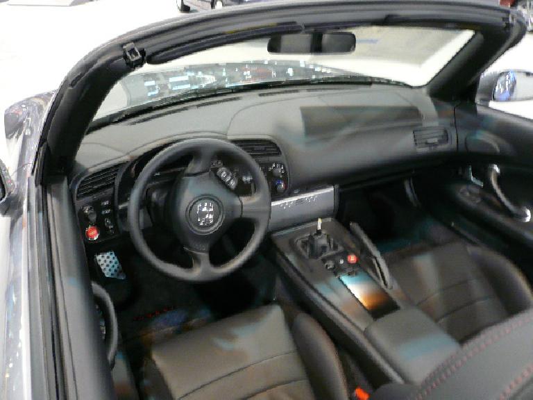 My nomination for worst (ugliest and dated) interior of all cars at the show: the Honda S2000's.  Interiors have really come a long ways since the S2000 first came out. 