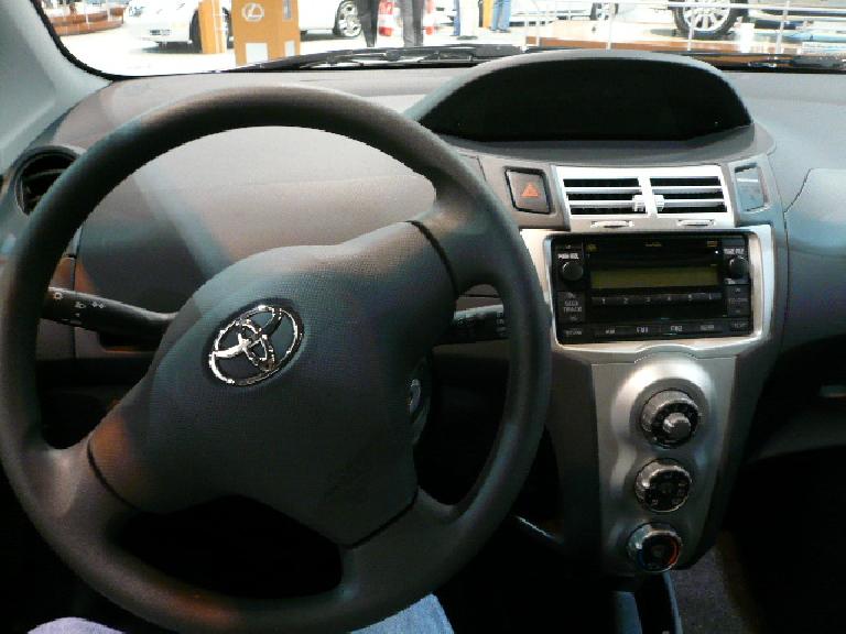 Toyota Yaris is an entry-level car, and the interior really underscores this.  Lots of hard plastics and cheap-looking.