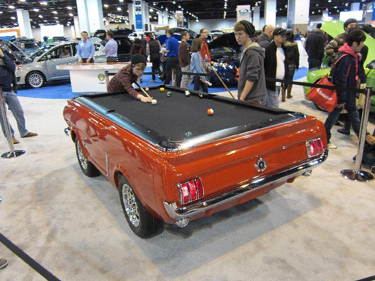 A pool table modeled after the original Mustang.