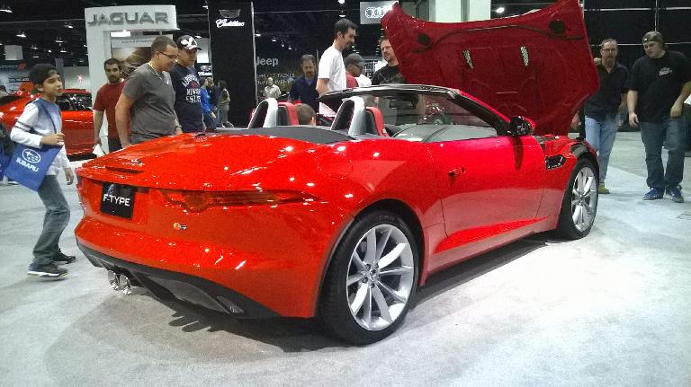Red Jaguar F-Type convertible.