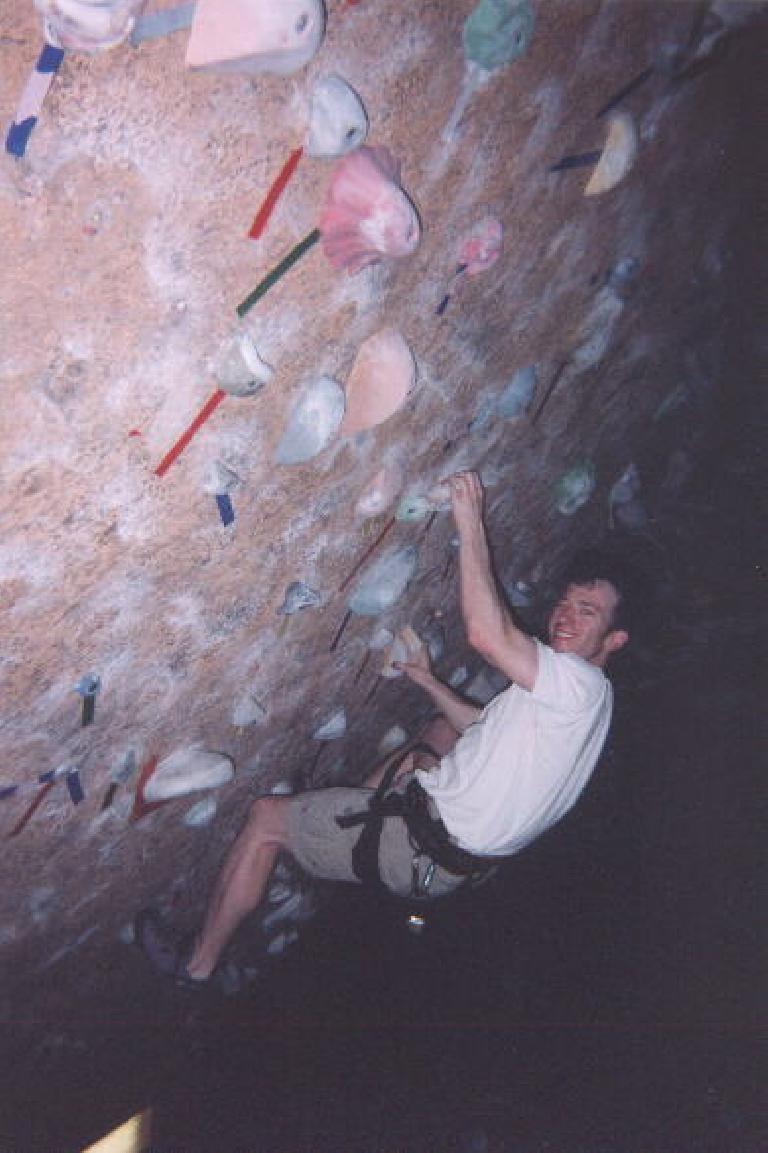 [Denver] After arriving in Denver, I got to do some indoor rock climbing with my friend Ken at the Rock 'n Jam gym.  Here's Ken showing how it's done in the boulder cave.