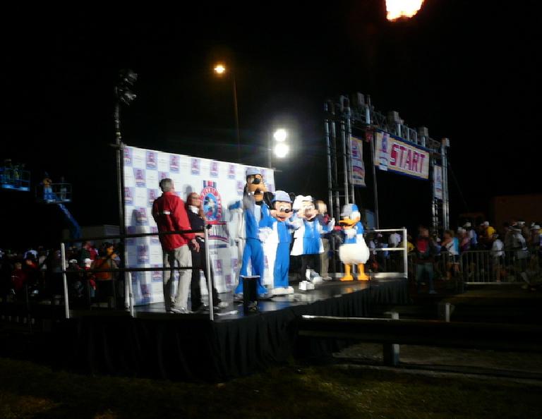 [Mile 0, 5:50 a.m.] Goofy, Mickey, and Donald were on hand to wish the runners good luck.