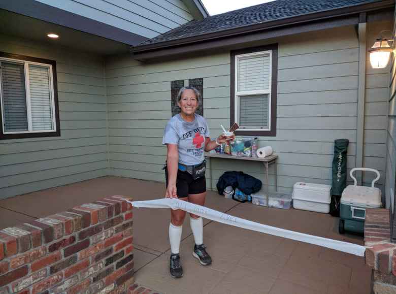 Alene fashioned a start line for the DIY Hearthfire Ultra using toilet paper and a Sharpie pen at Crisann's house.