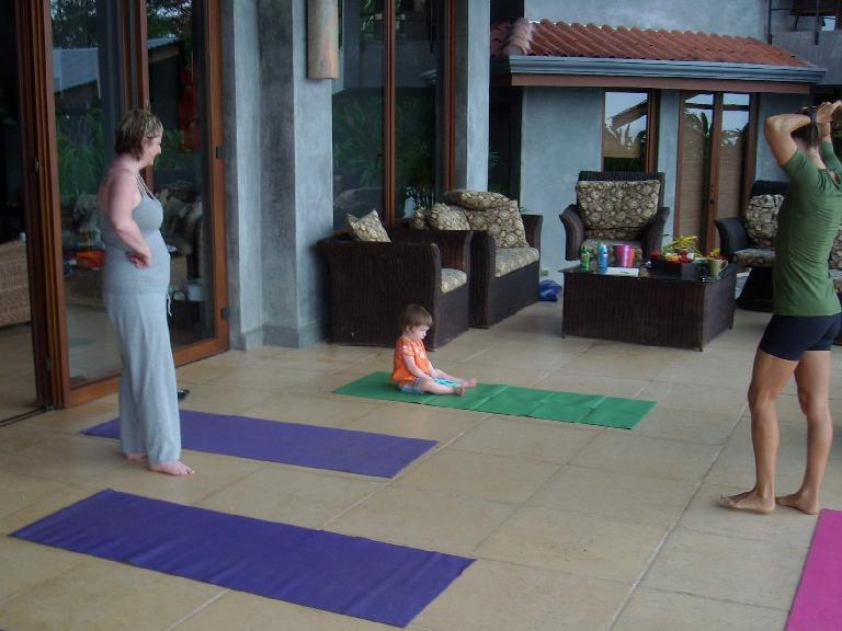 Doing yoga with Charis, little Zoe, and our super fit yoga instructor Kelly.