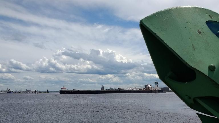 A long ship coming into the harbor in Duluth, Minnesota.