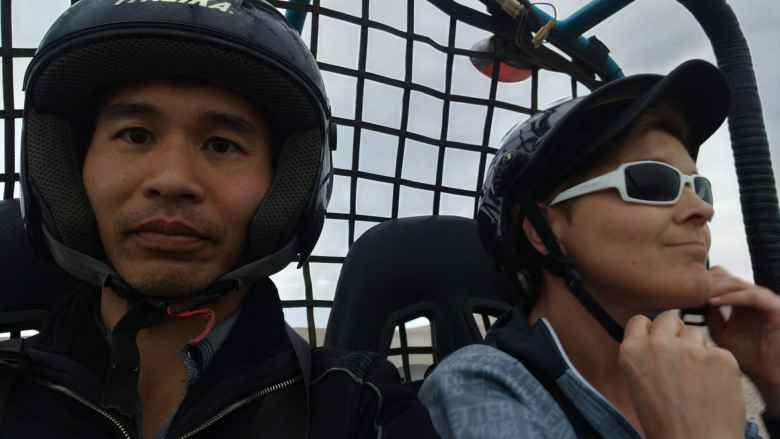Felix Wong and Mel in the dune buggy in Paracas.
