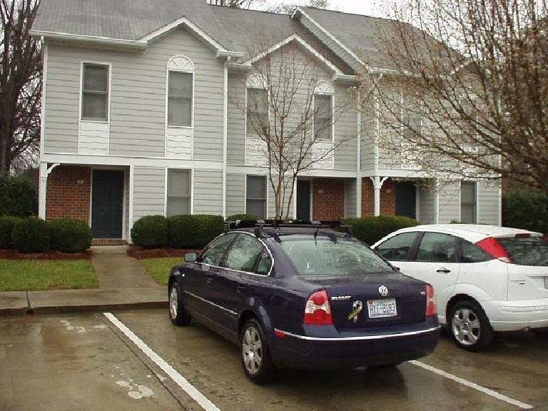 dark blue Volkswagen Passat, white Ford Focus 5-door hatchback, townhomes, Durham, North Carolina