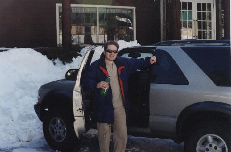 Brent and his Chevy Blazer in front of the Strawberry Inn.