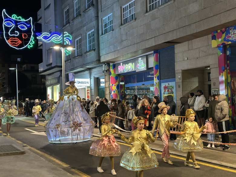 People dressed up in gold tops and jewel box-like skirts.