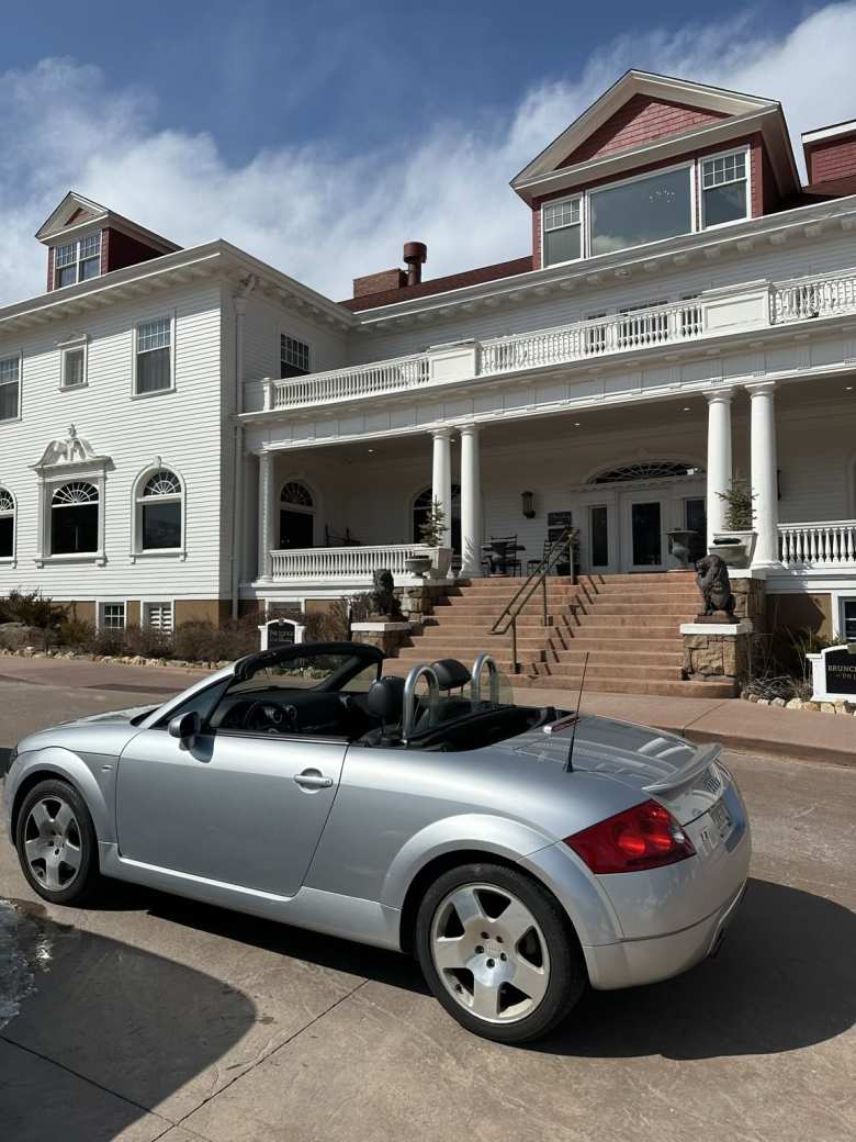My silver Audi TT Roadster Quattro in front of the Stanley Hotel.