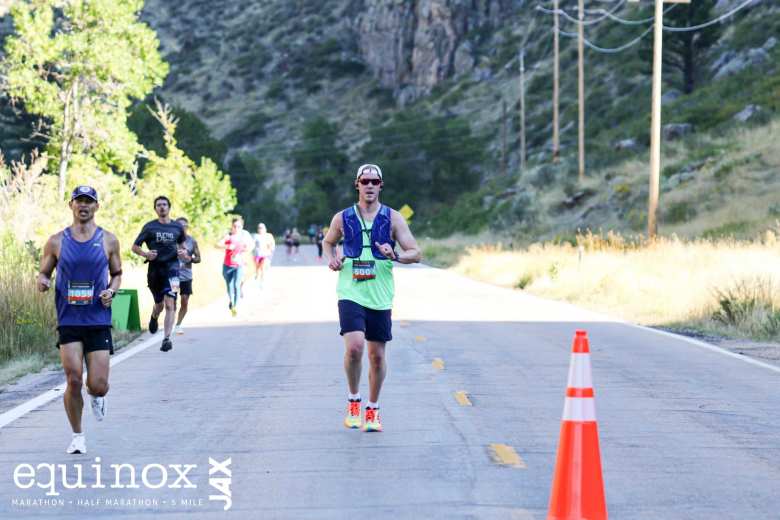 Felix near the edge of the road amongst fast runners