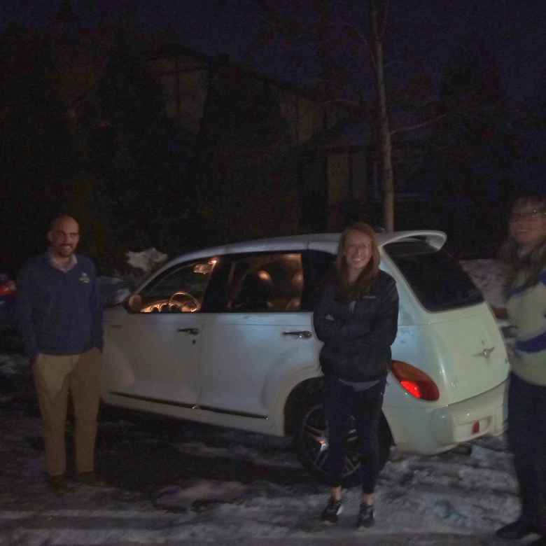 Manuel, Brooke, and Angela saying goodbye to Peter the PT Cruiser GT.