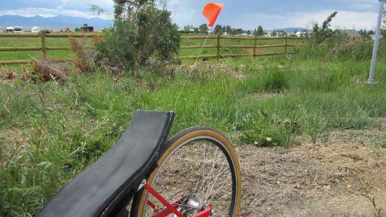 "You really need a flag or something," advised a startled motorist.  Found one on the ground two miles later.